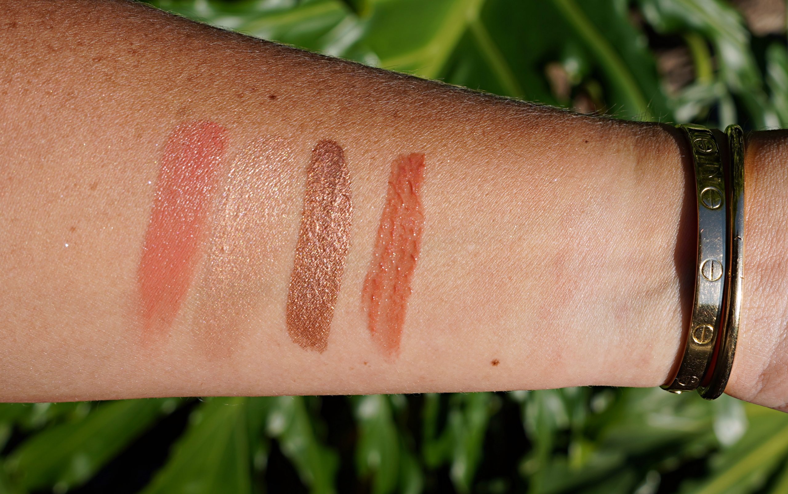 Swatches of the Kosas Ready in 5 Set in direct sunlight
