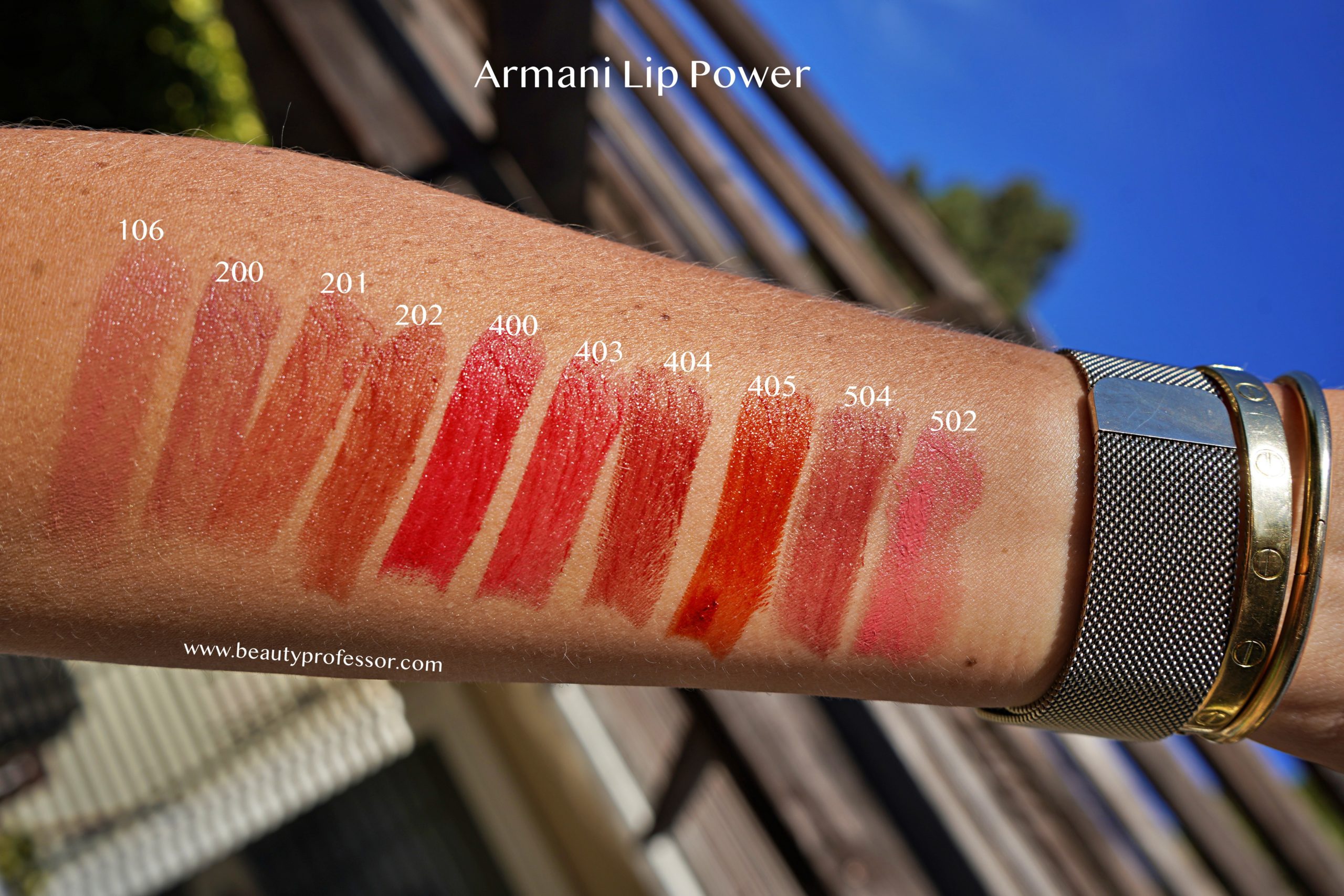 Giorgio Armani lip power swatches on an arm