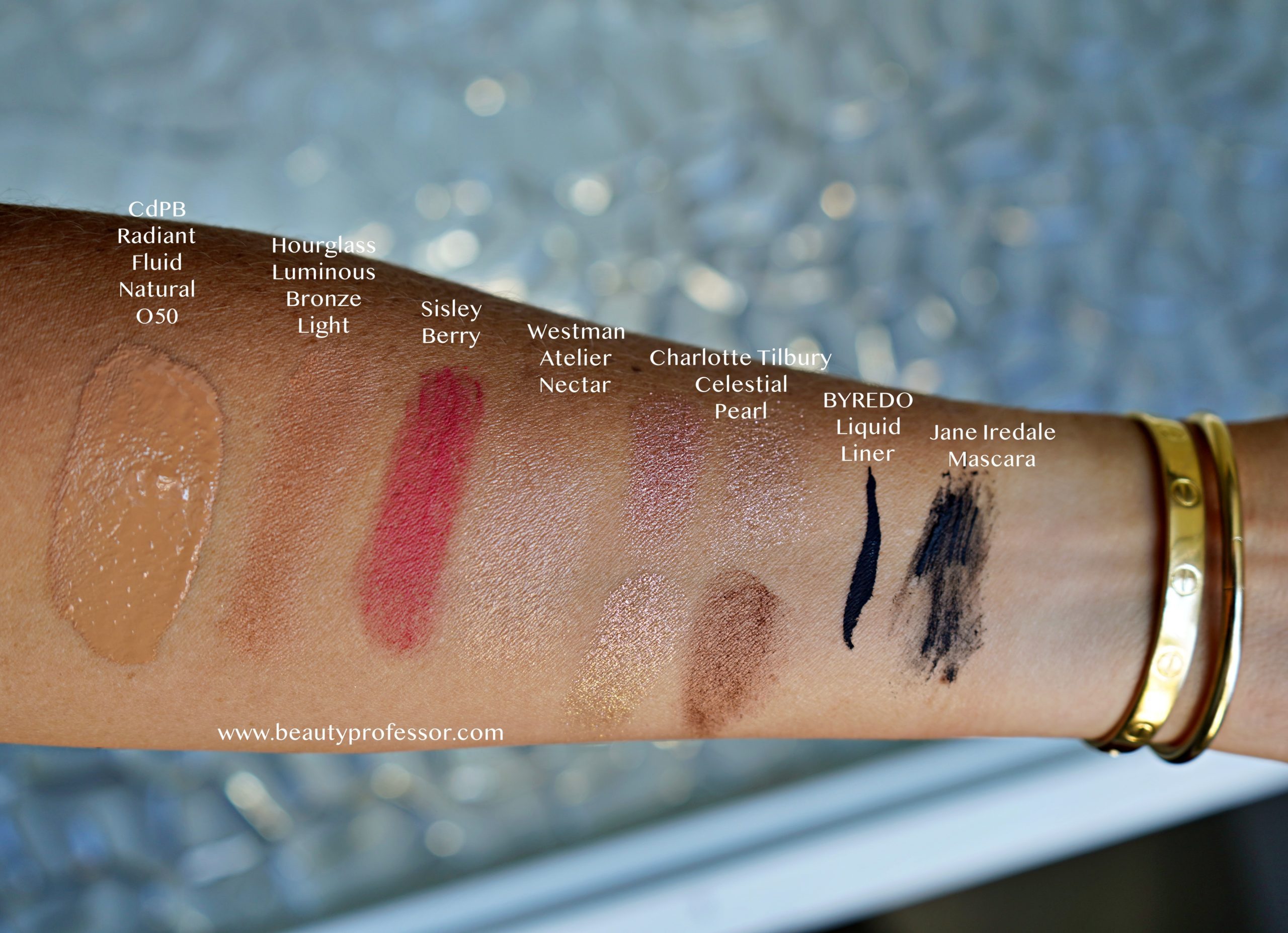 face products swatches on an arm 