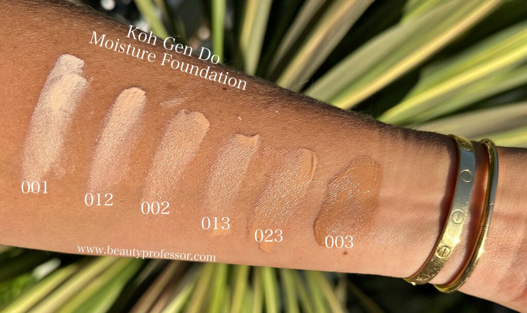 Five swatches of the Koh Gen Do Moisture Foundation in direct sunlight.