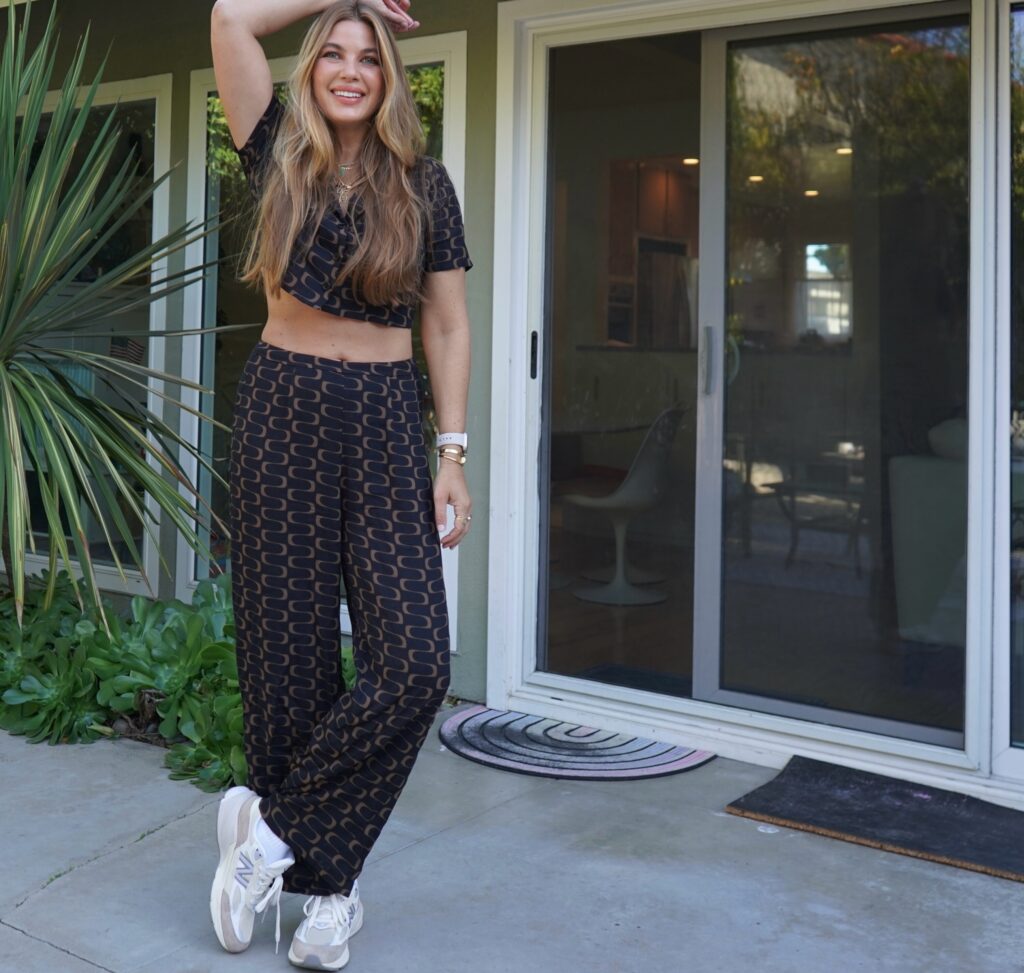 Beauty Professor Blogger Rachel Anise Wegter  wearing chic two-piece set and New Balance sneakers